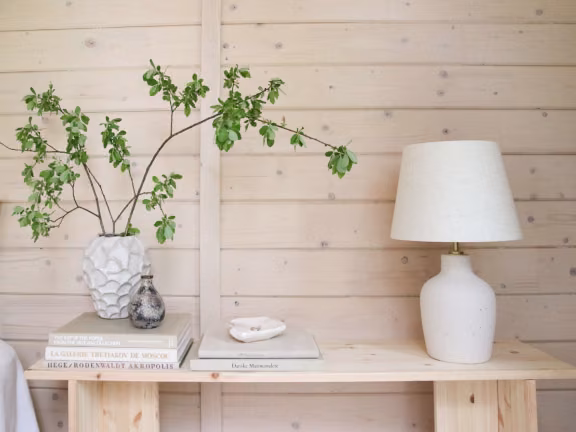 wooden log cabin painted with soothing colours
