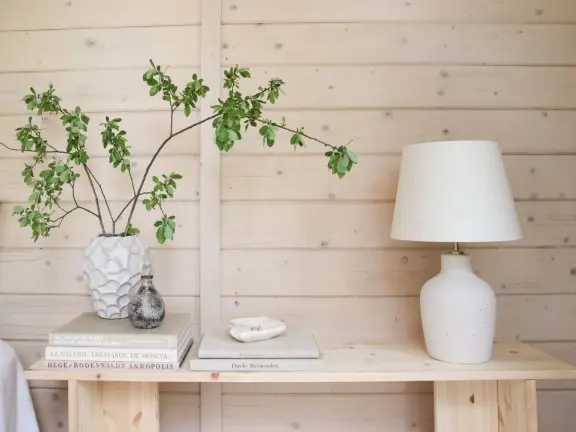 wooden log cabin painted with soothing colours